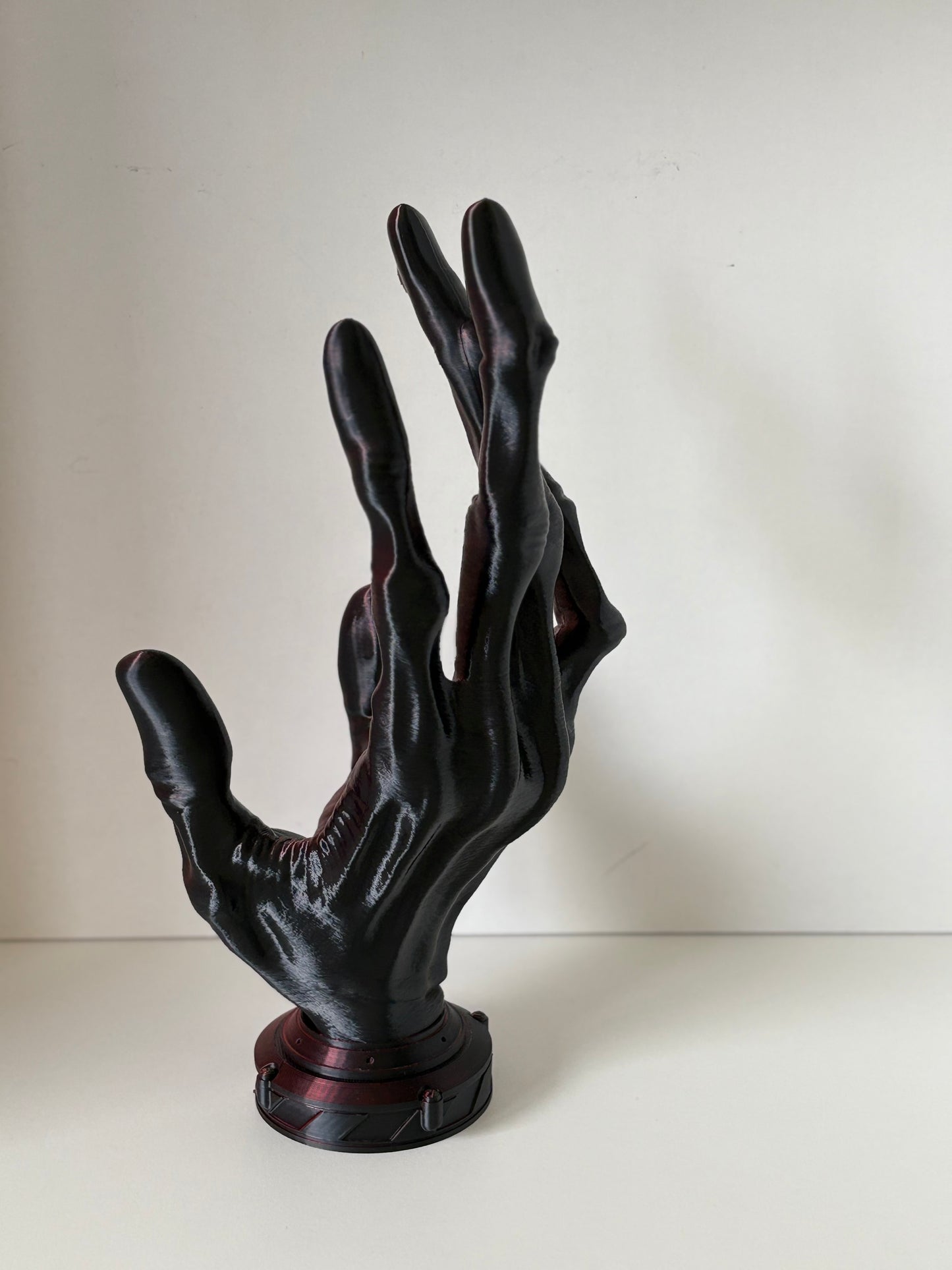 Porte manettes main alien