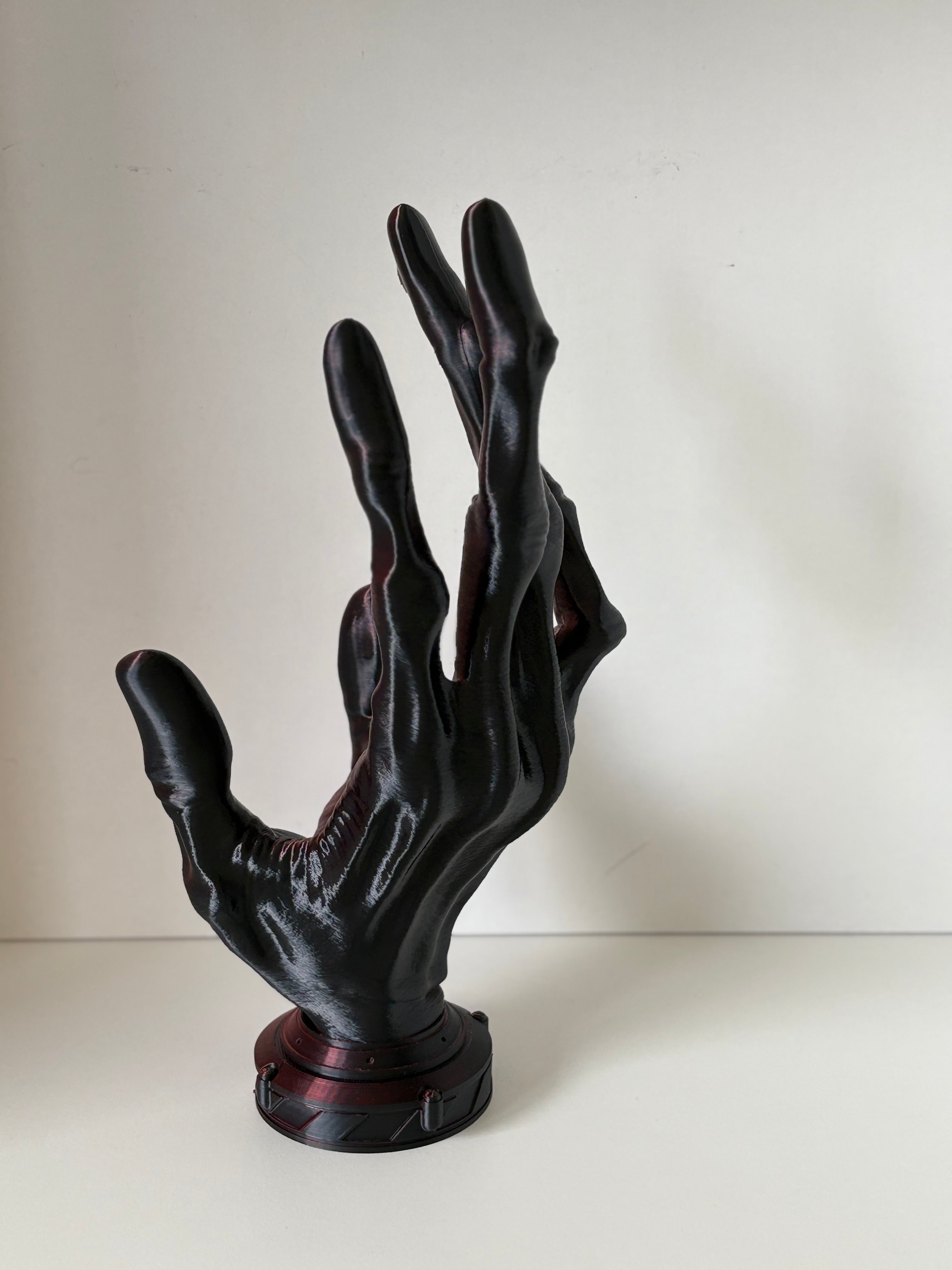 Porte manettes Main Alien